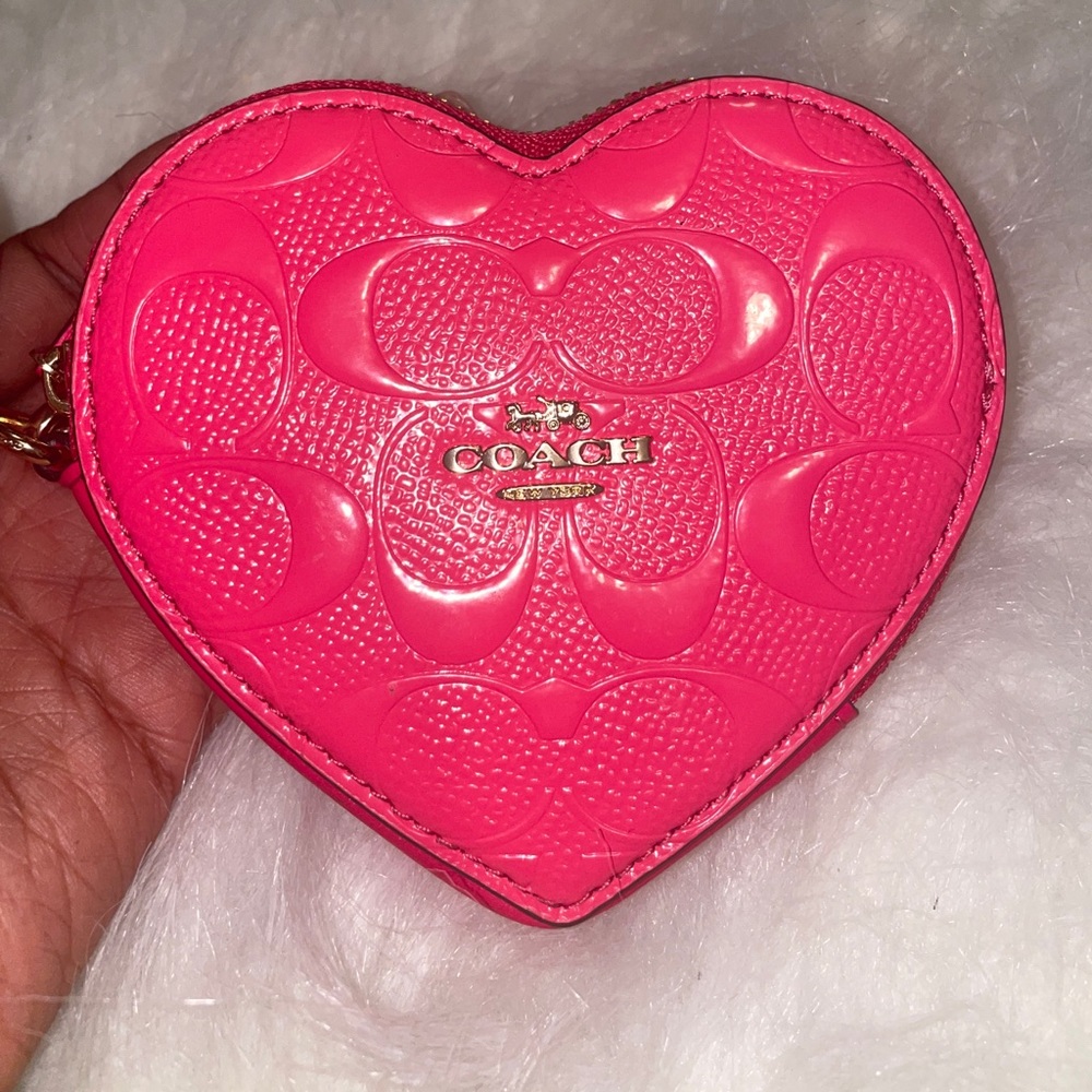 Neon pink Coach coin purse/wristlet